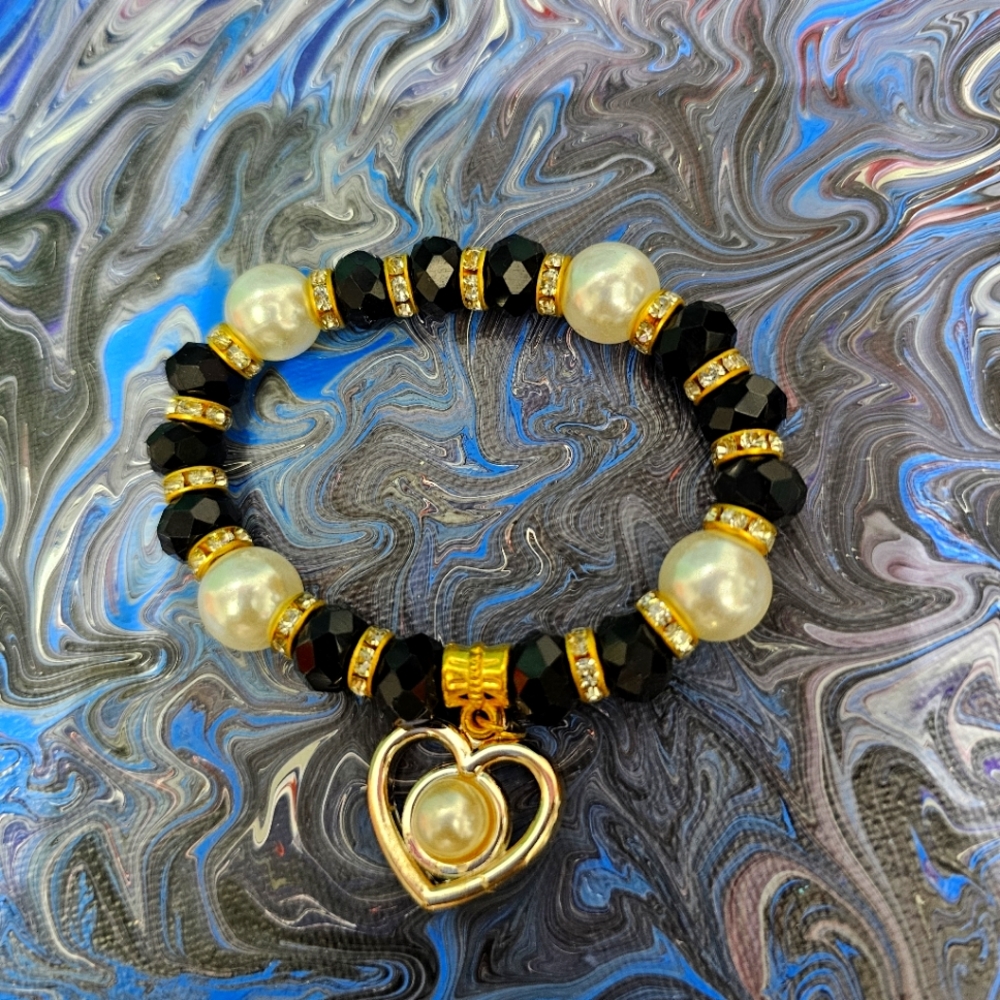 Black, white, and gold bracelet